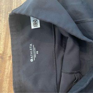 Size XS Athleta black leggings with pockets.